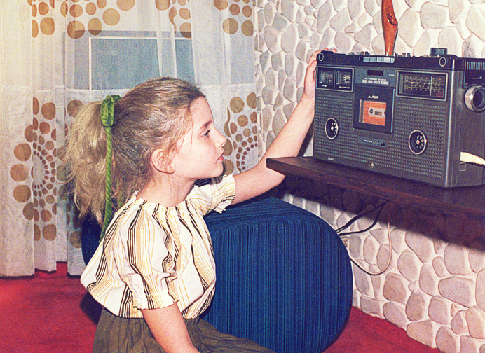 Young girl listening to the radio for representing Dateable Blog